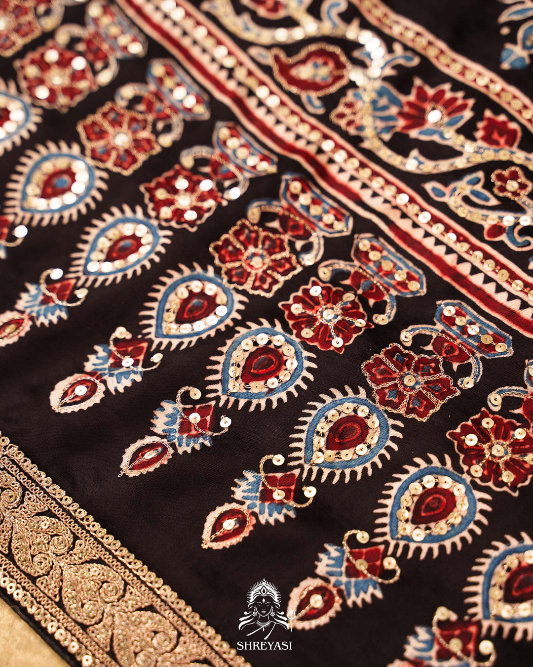 Handloom Pure Modal Silk Ajrakh Hand Block Printed Saree with Natural Dyes, All Over Aari Embroidery & Embroidered Borders