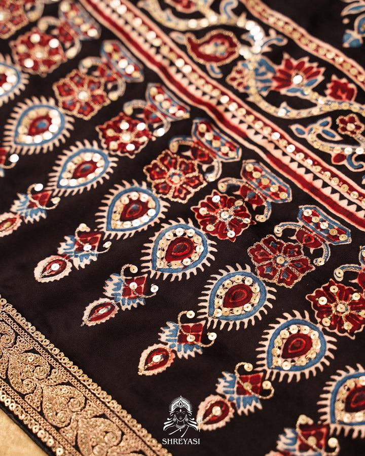 Handloom Pure Modal Silk Ajrakh Hand Block Printed Saree with Natural Dyes, All Over Aari Embroidery & Embroidered Borders