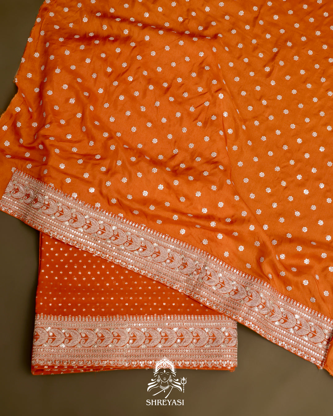 Georgette Saree with Embroidered Borders and Satin Embroidered Blouse