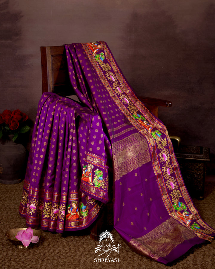 Handloom Pure Kanjivaram Silk Saree in Real Zari with Tanjore Madhura Meenakshi, Mayil and Kamalam Artwork