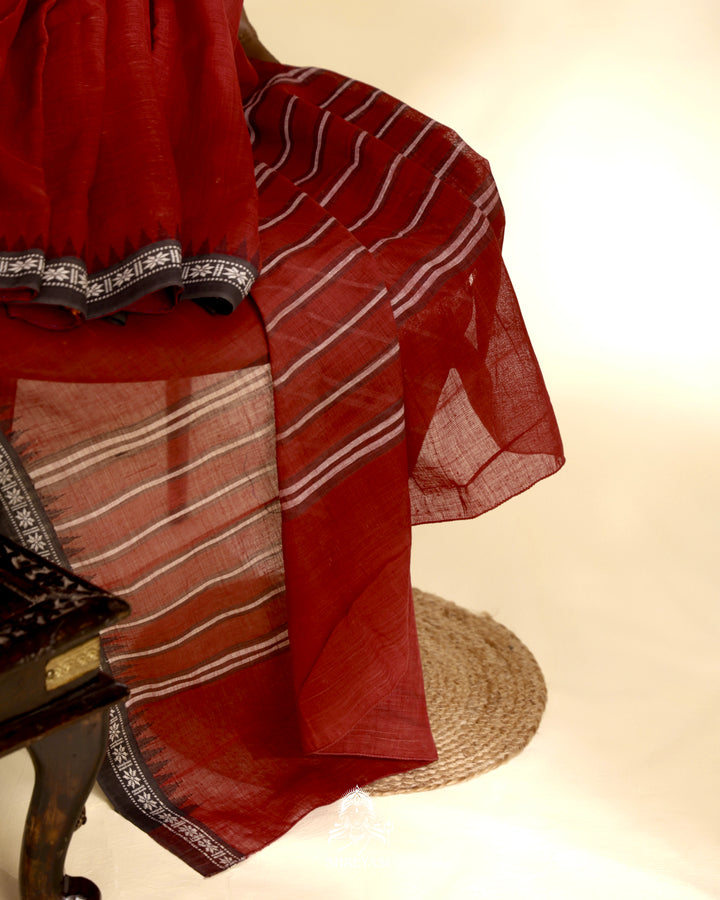 Handloom Bawan Buta cotton saree with contrast borders and a soft breathable drape