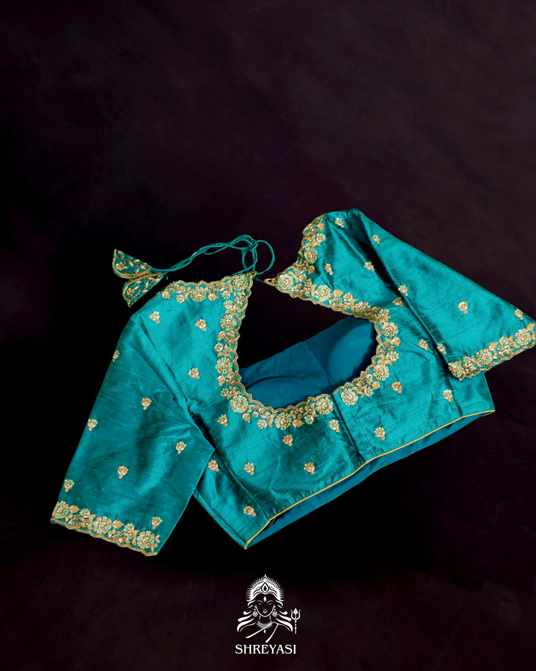 Banarasi Ektara silk saree in soft green with jamdani-style cutwork motifs and subtle woven border