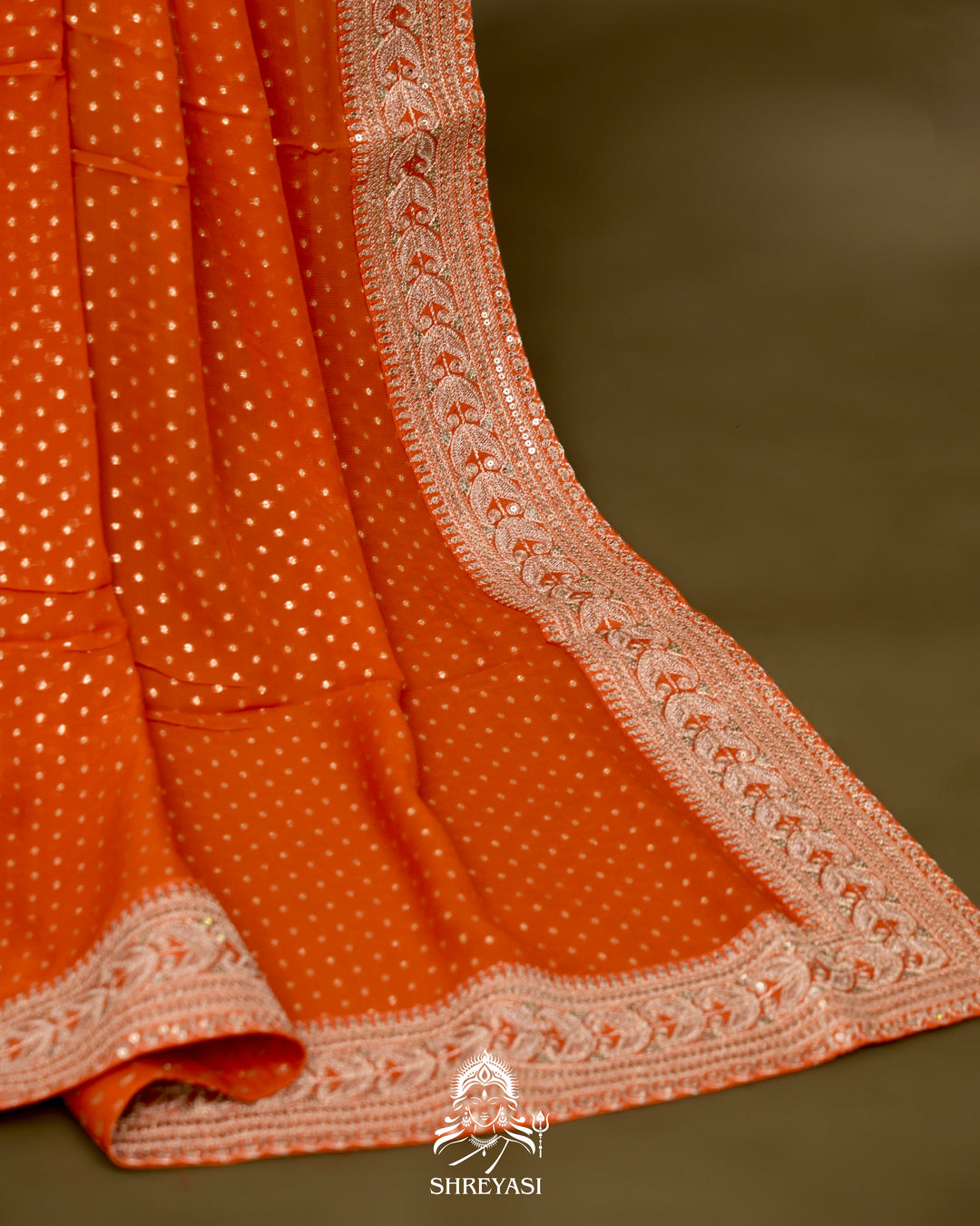 Georgette Saree with Embroidered Borders and Satin Embroidered Blouse