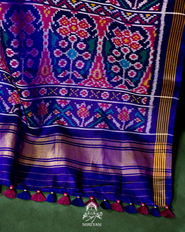 Handloom Pure Rajkot Single Ikat Patola Silk Saree with Hand-Embroidered Raw Silk Blouse
