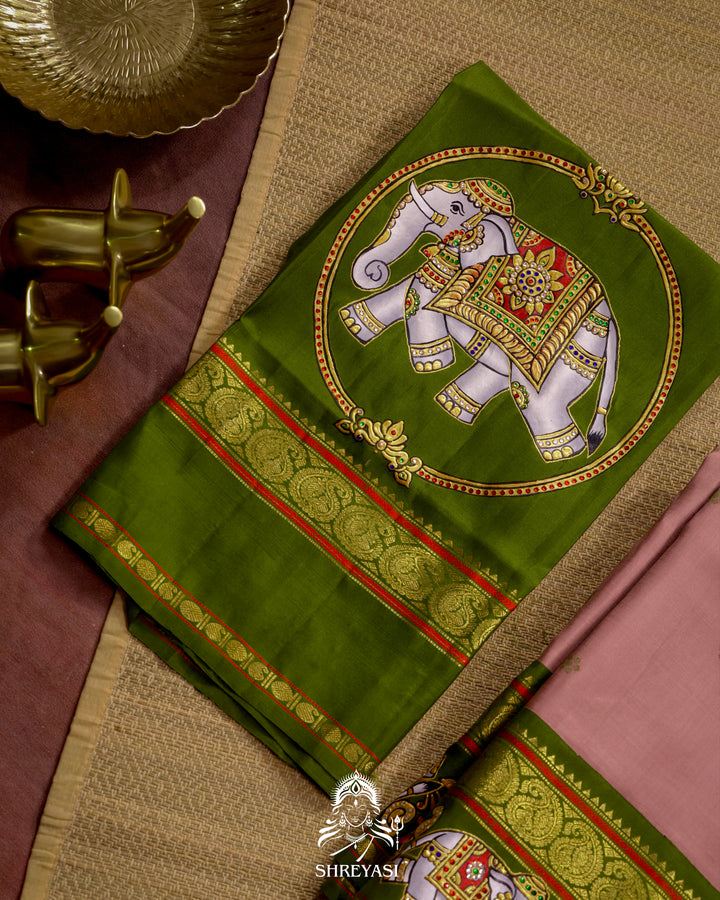 Handloom Pure Kanjivaram Silk Saree in Real Zari with Tanjore Yanai and Kamalam Artwork