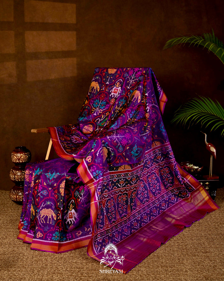 Handloom Pure Rajkot Patola Silk Saree with Animal & Floral Ikat Motifs