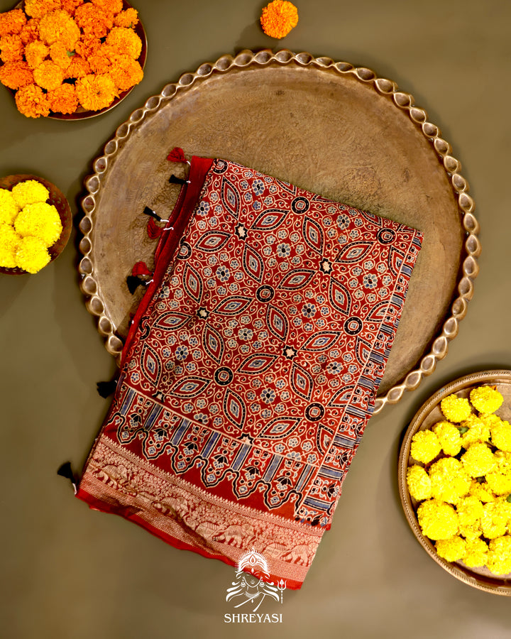 Hand Block Printed Ajrakh Dola Silk Saree with Zari Brocade Blouse