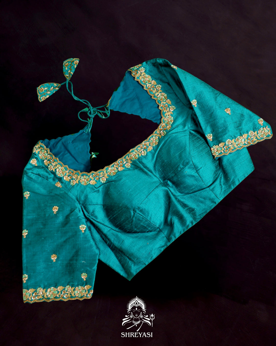 Banarasi Ektara silk saree in soft green with jamdani-style cutwork motifs and subtle woven border