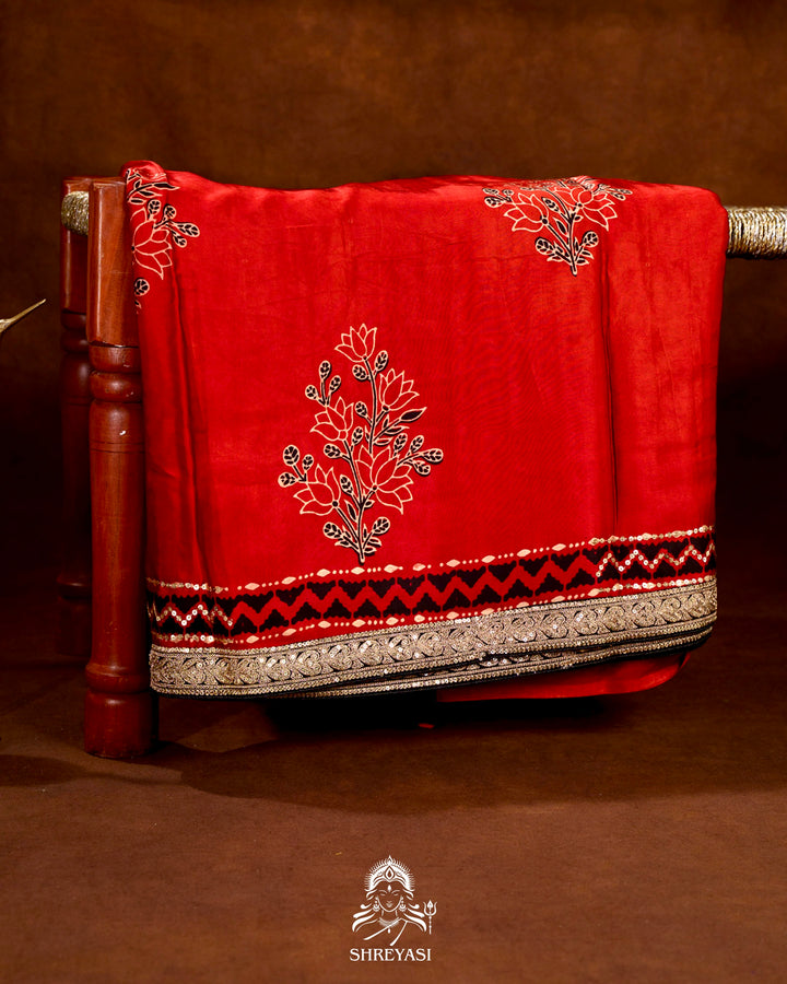 Handloom Pure Modal Silk Ajrakh Hand Block Printed Saree with Natural Dyes, All Over Aari Embroidery & Embroidered Borders