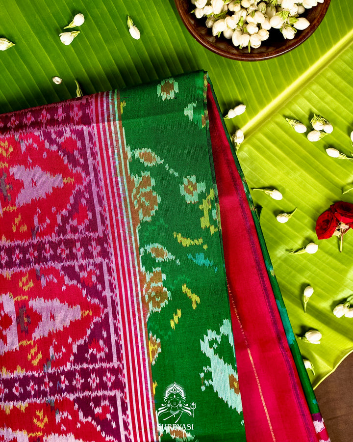 Handloom Pure Rajkot Patola Silk Saree in Emerald Green with Animal & Floral Ikat Motifs