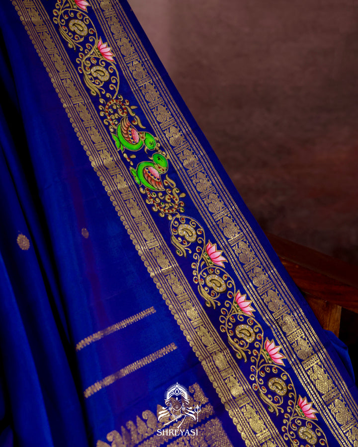 Handloom Pure Kanjivaram Silk Saree in Real Zari with Tanjore Mayil and Kamalam Artwork