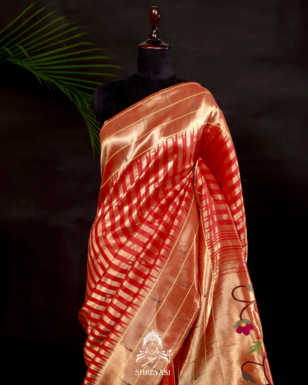 Handloom pure Paithani silk saree with woven zari stripes, delicate bhutis, and traditional Paithani motif designer pallu in vibrant hues
