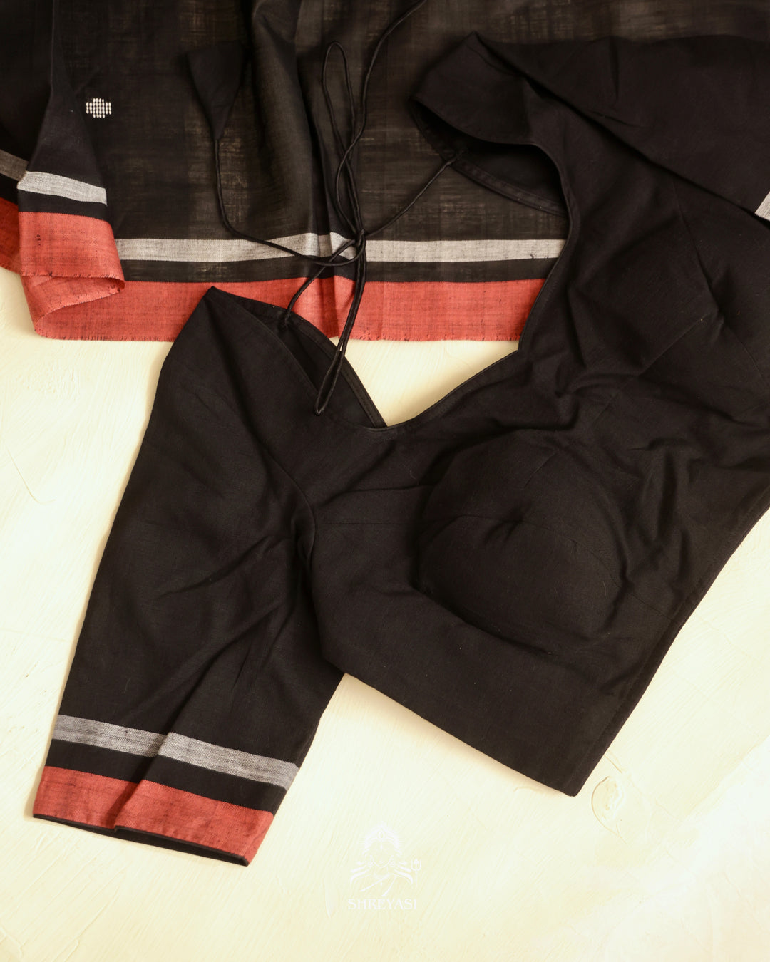 Handloom Bawan Buta cotton saree featuring traditional Jamdani woven motifs and contrast borders