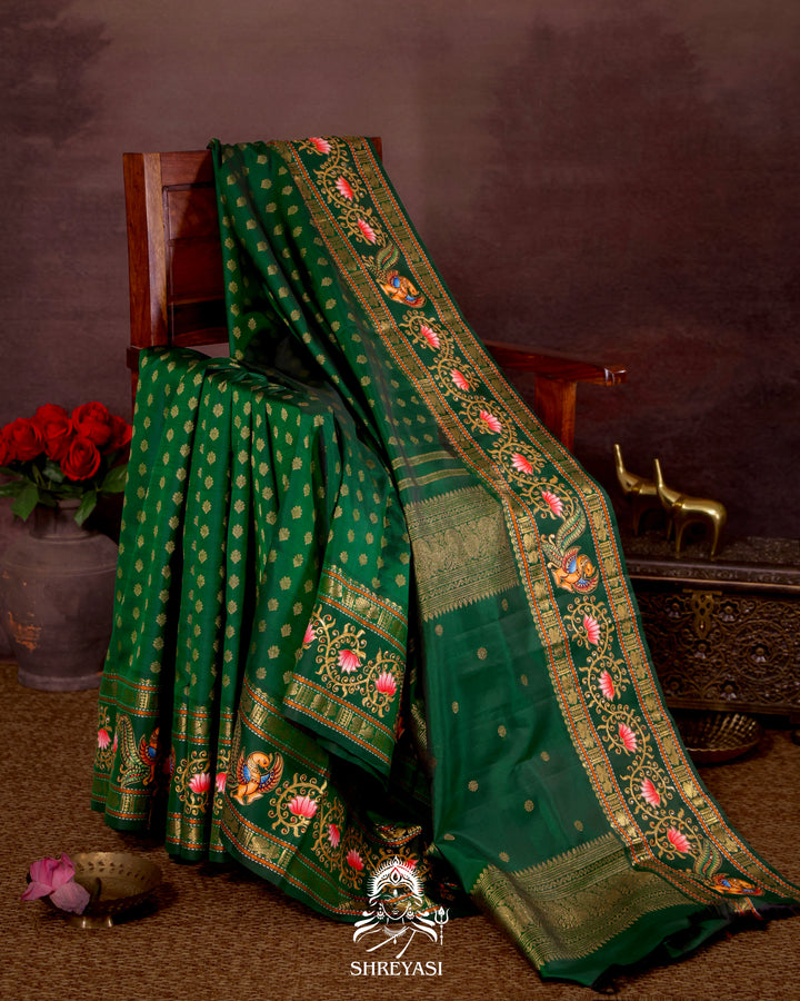 Handloom Pure Kanjivaram Silk Saree in Real Zari with Tanjore Kili and Kamalam Artwork