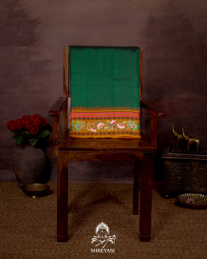 Handloom Pure Kanjivaram Silk Saree in Real Zari with Tanjore Mayil and Kamalam Artwork