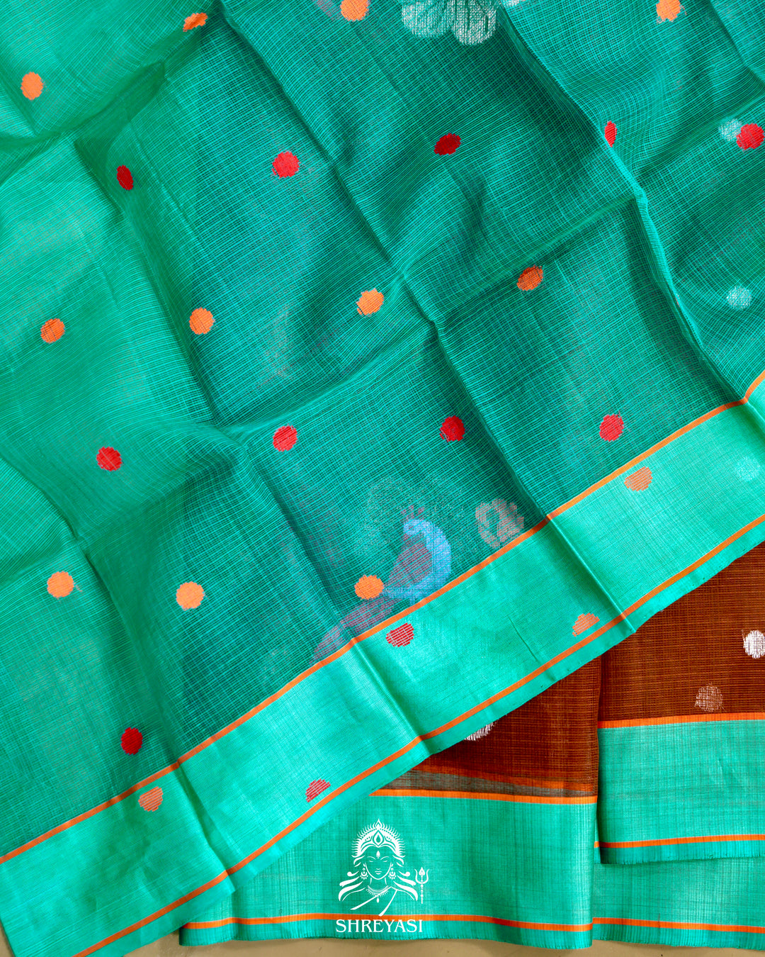 Zari Kota Silk Saree with Bird Motifs and Contrast Turquoise Blouse