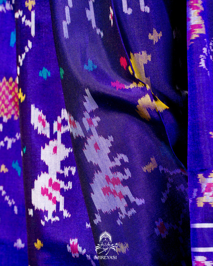 Handloom Pure Rajkot Single Ikat Patola Silk Saree with Hand-Embroidered Raw Silk Blouse