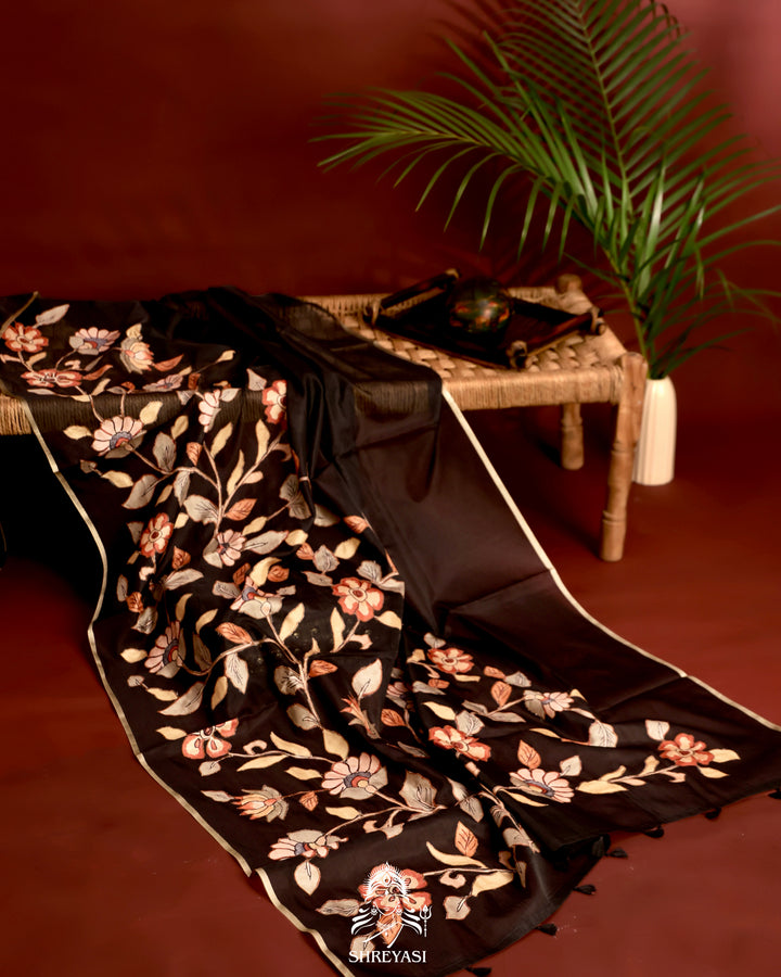 Kota saree with floral kalamkari appliqué work, contrast border, and lightweight breathable drape