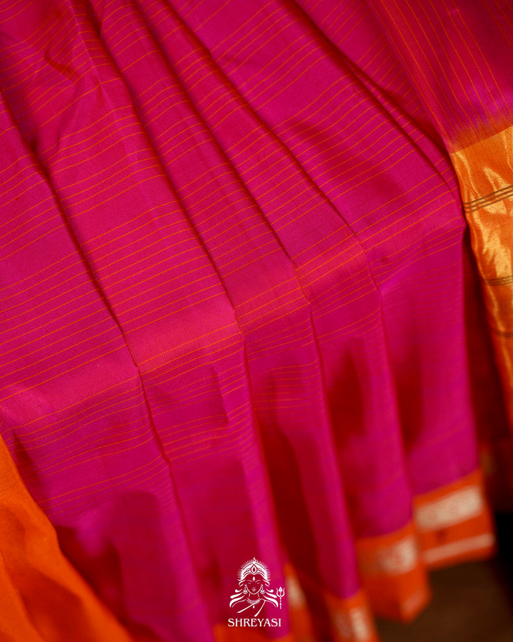 Handloom Pure Gadwal Silk Saree in Rani Pink with Orange Tissue Muniya Border