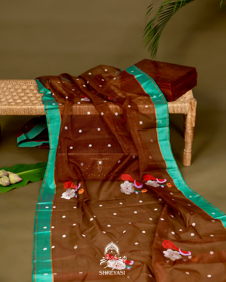 Zari Kota Silk Saree with Bird Motifs and Contrast Turquoise Blouse