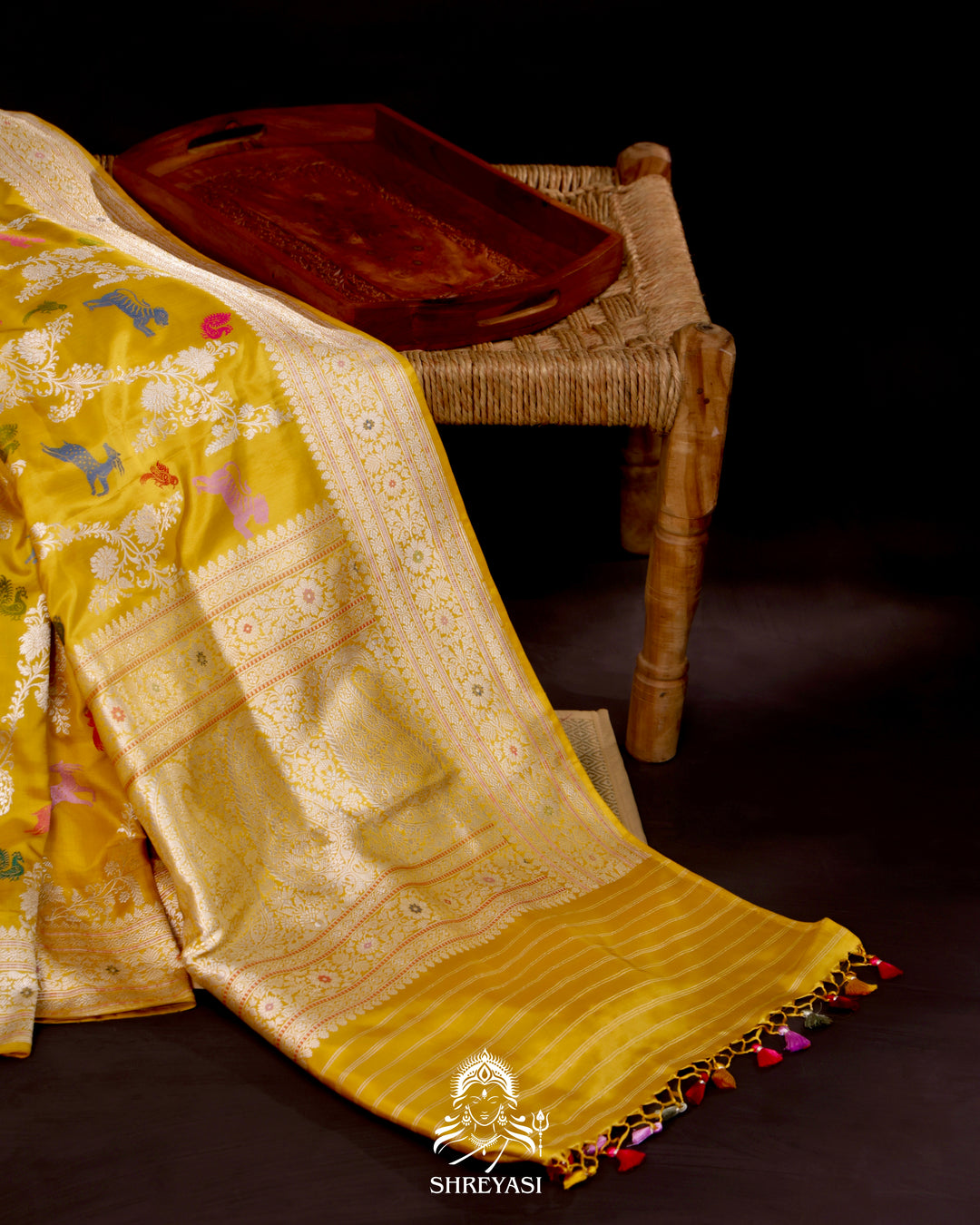 Banarasi Ektara silk saree in marigold yellow with kadhwa meenakari animal motifs and full zari border