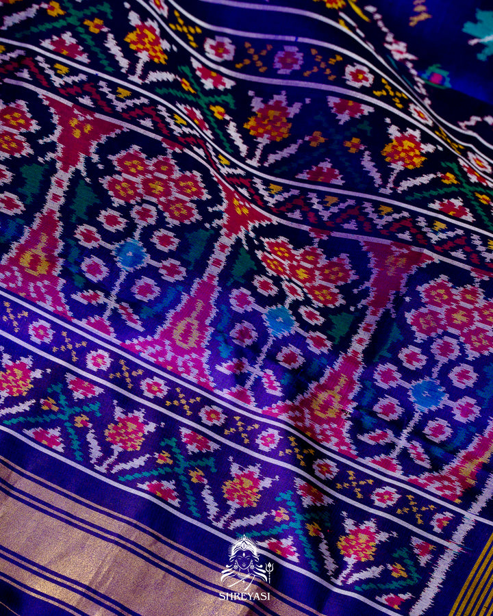 Handloom Pure Rajkot Single Ikat Patola Silk Saree with Hand-Embroidered Raw Silk Blouse