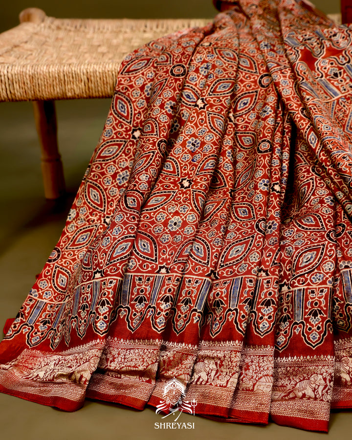 Hand Block Printed Ajrakh Dola Silk Saree with Zari Brocade Blouse