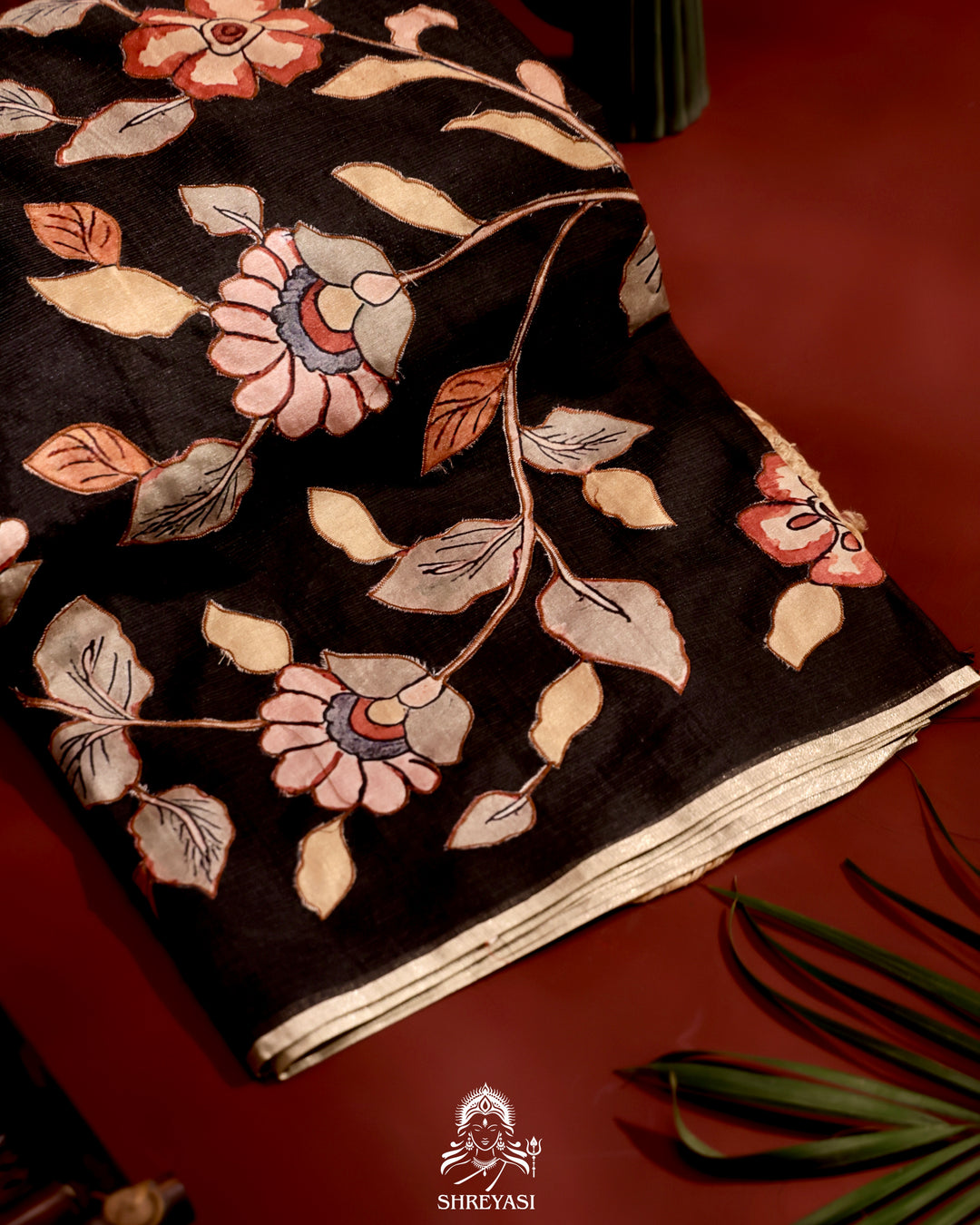 Kota saree with floral kalamkari appliqué work, contrast border, and lightweight breathable drape