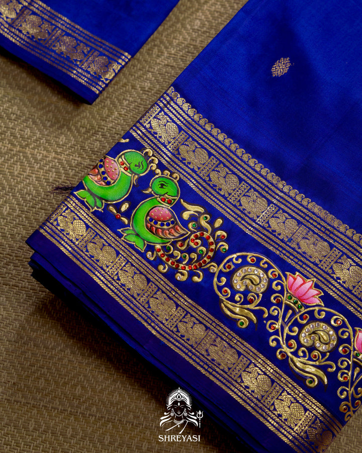 Handloom Pure Kanjivaram Silk Saree in Real Zari with Tanjore Mayil and Kamalam Artwork