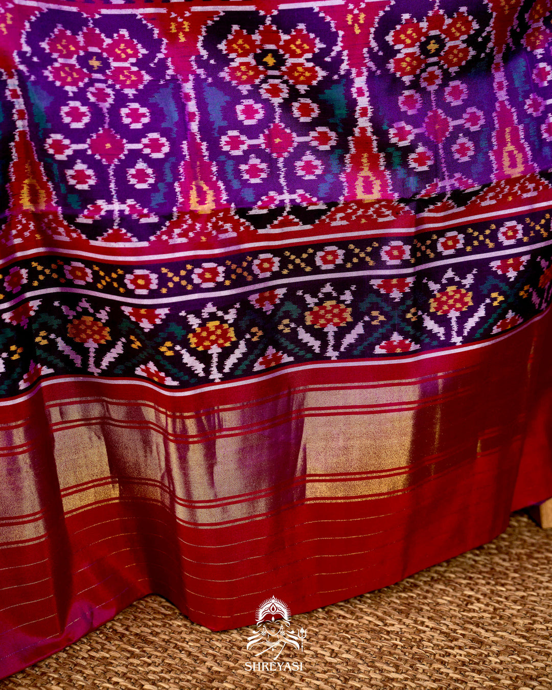 Handloom Pure Rajkot Patola Silk Saree with Animal & Floral Ikat Motifs