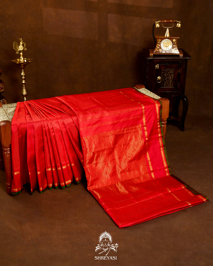 Handloom Pure Gadwal Silk Saree in Crimson Red with Gold Zari Checks