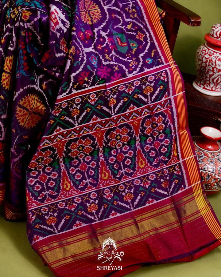 Handloom Rajkot Patola Silk Saree in Deep Violet with Multicolor Ikat