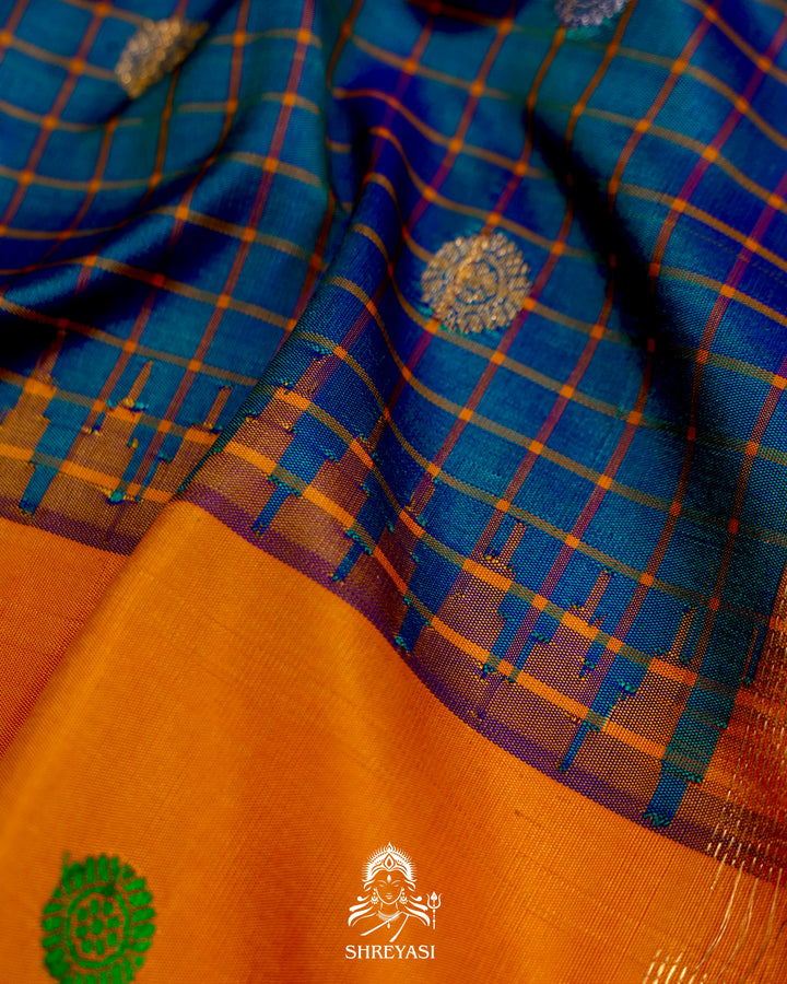 Handloom Pure Gadwal Silk Saree
in Kuttu Weaving and Rich Zari Pallu