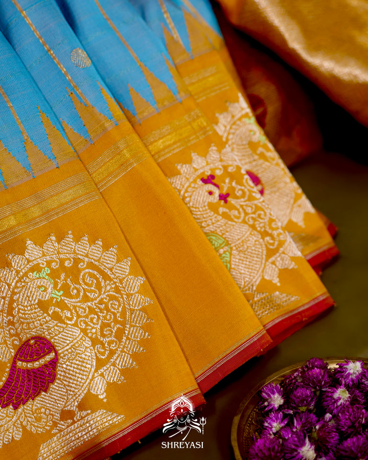 Handloom Pure Gadwal Silk Saree with Kuttu Korvai Border and Zari Peacock Motifs