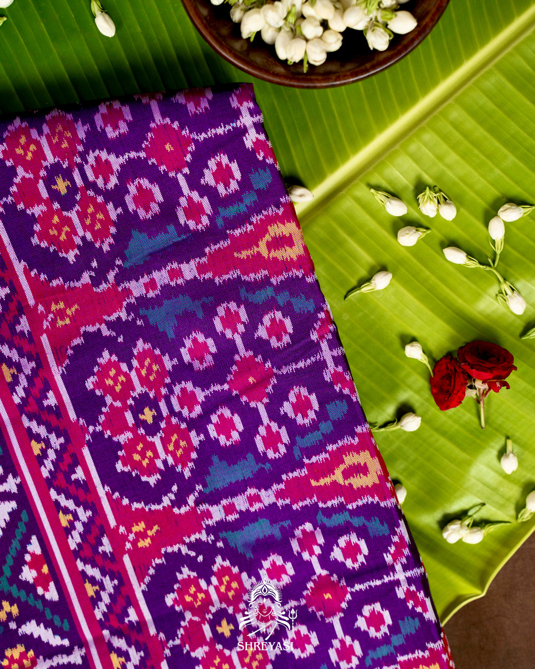 Handloom Pure Rajkot Patola Silk Saree with Animal & Floral Ikat Motifs