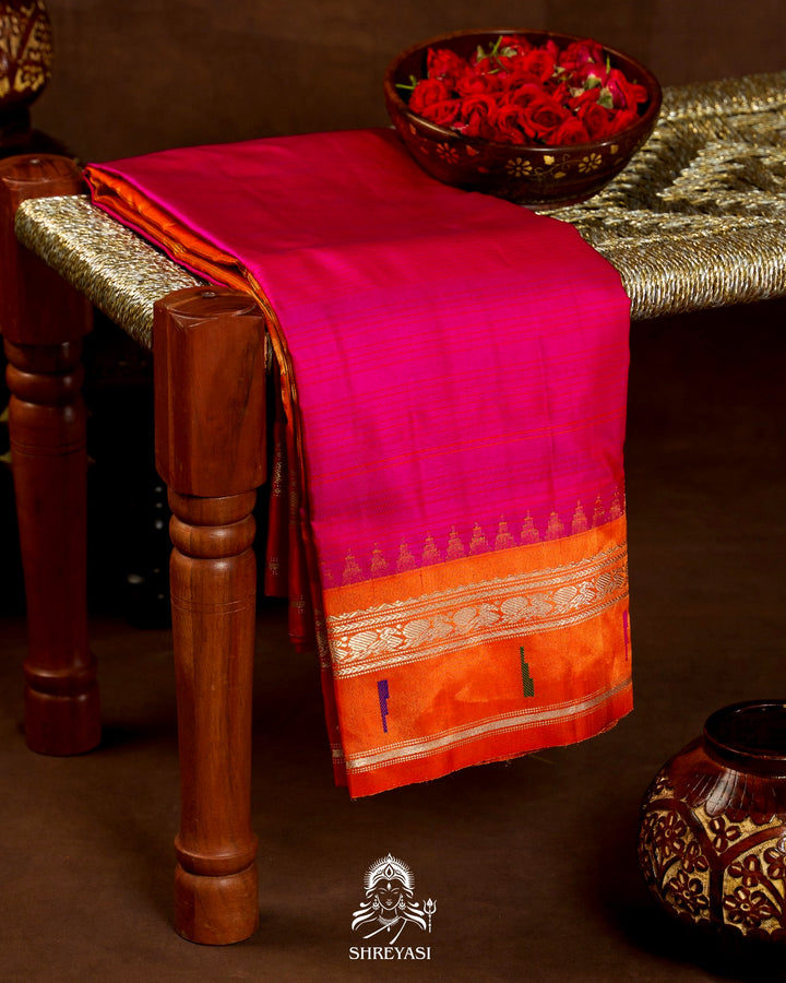 Handloom Pure Gadwal Silk Saree in Rani Pink with Orange Tissue Muniya Border