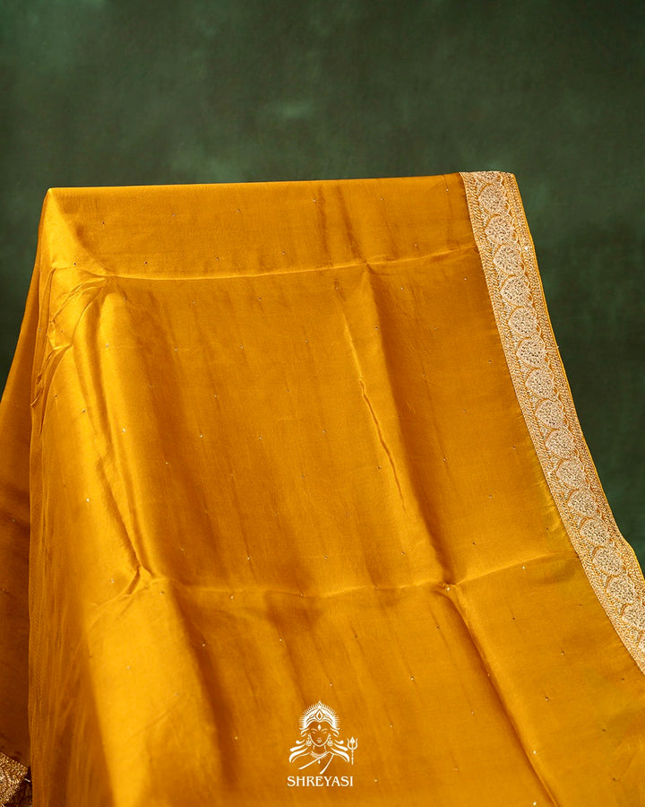 Pure Organza Silk Saree with Embellished Borders and Patola Print Silk Blouse