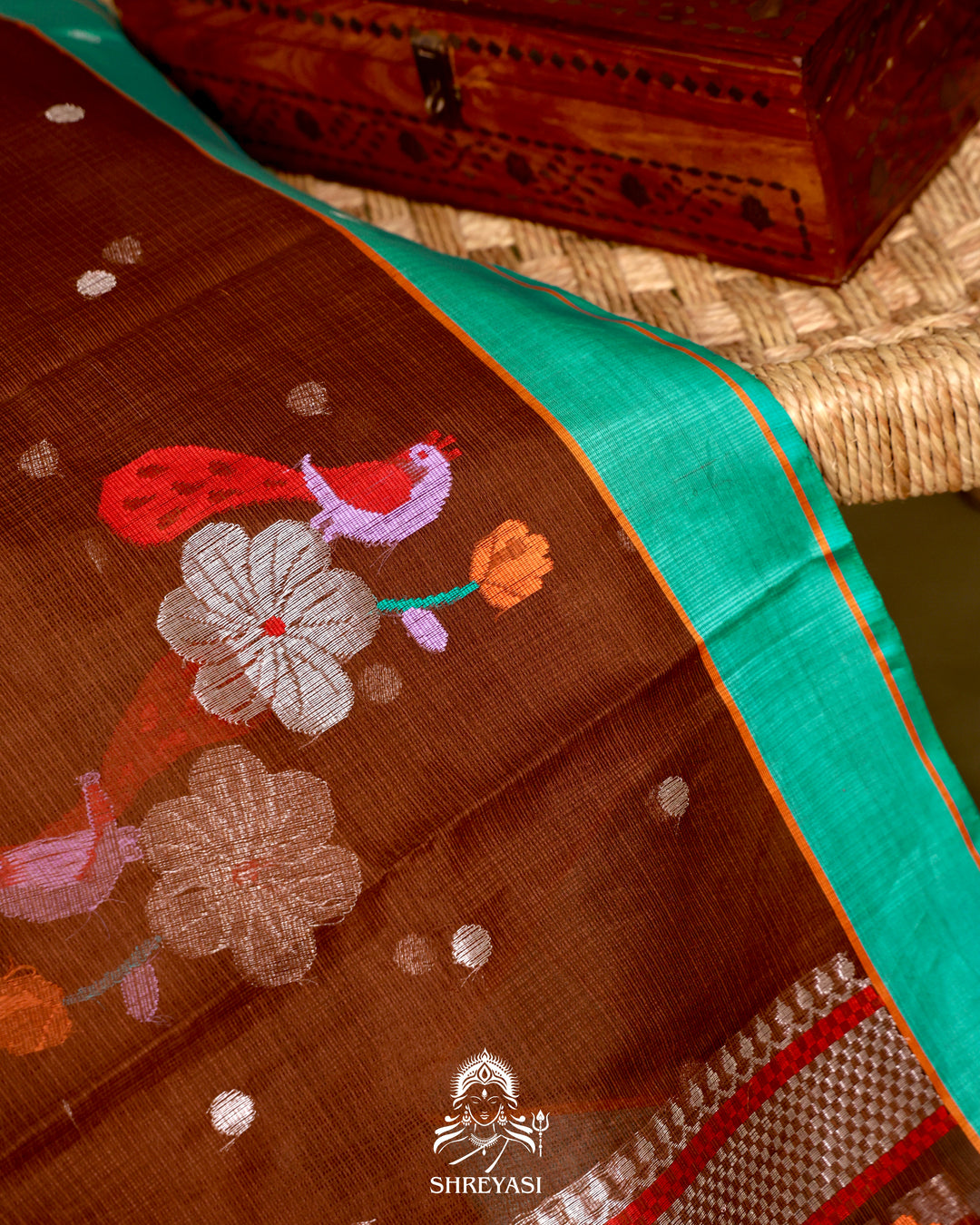 Zari Kota Silk Saree with Bird Motifs and Contrast Turquoise Blouse
