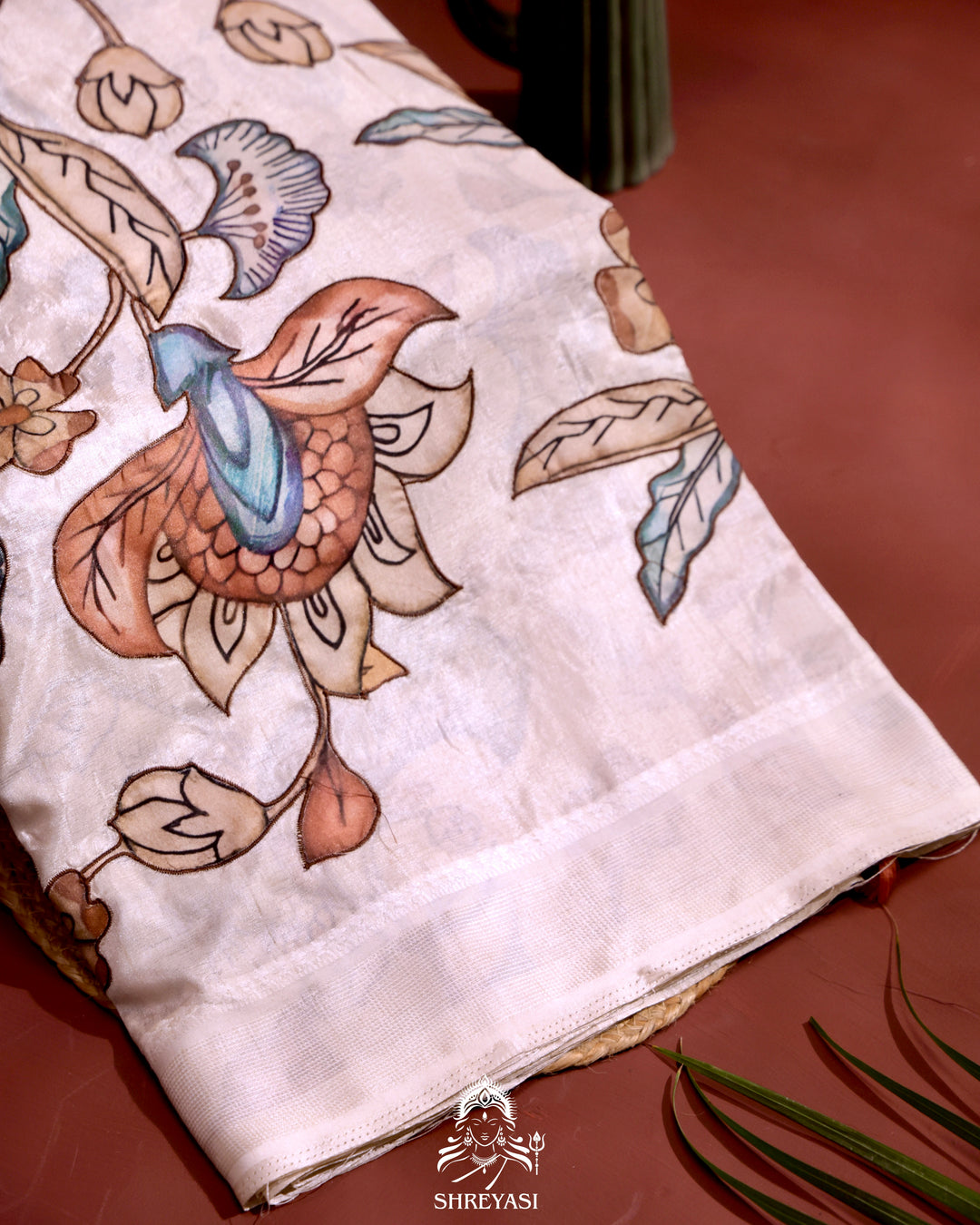 Kota saree with floral kalamkari appliqué work, contrast border, and lightweight breathable drape