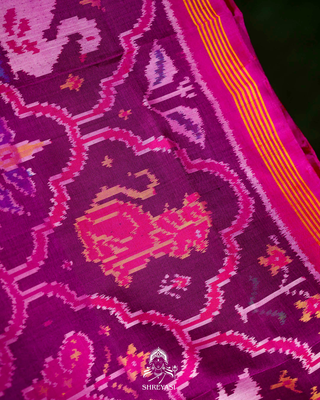 Handloom Rajkot Patola Silk Saree in Purple with Multicolor Ikat