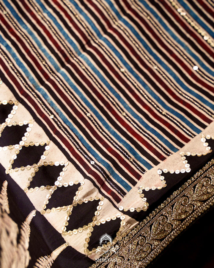 Handloom Pure Modal Silk Ajrakh Hand Block Printed Saree with Natural Dyes, All Over Aari Embroidery & Embroidered Borders