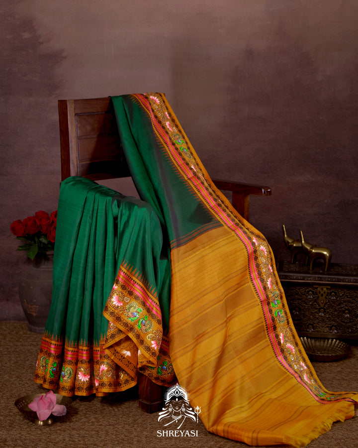 Handloom Pure Kanjivaram Silk Saree in Real Zari with Tanjore Mayil and Kamalam Artwork