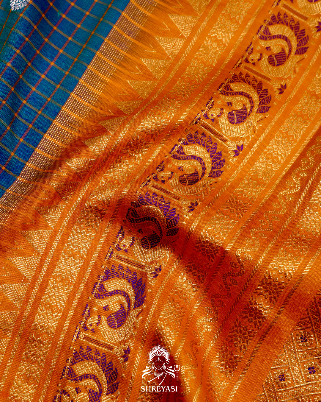 Handloom Pure Gadwal Silk Saree
in Kuttu Weaving and Rich Zari Pallu