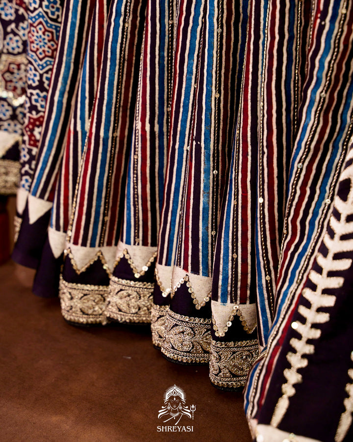 Handloom Pure Modal Silk Ajrakh Hand Block Printed Saree with Natural Dyes, All Over Aari Embroidery & Embroidered Borders
