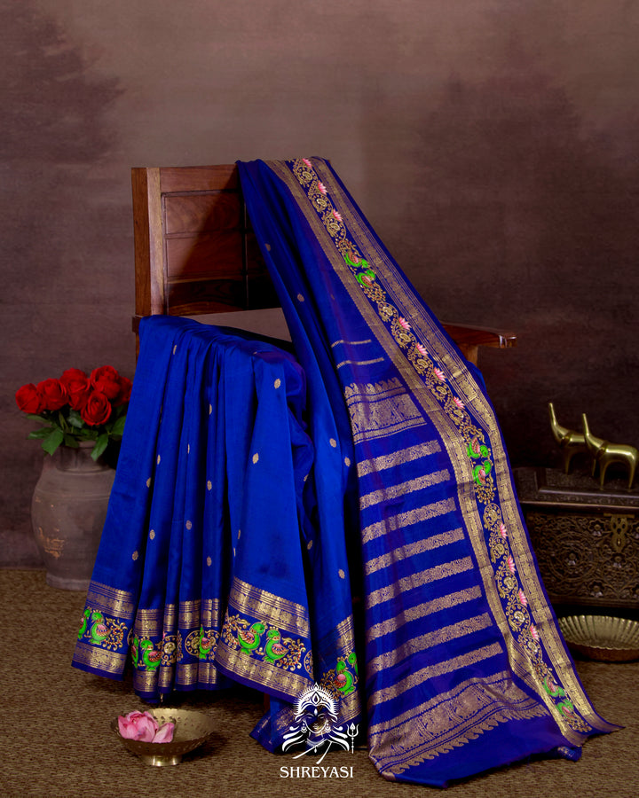 Handloom Pure Kanjivaram Silk Saree in Real Zari with Tanjore Mayil and Kamalam Artwork