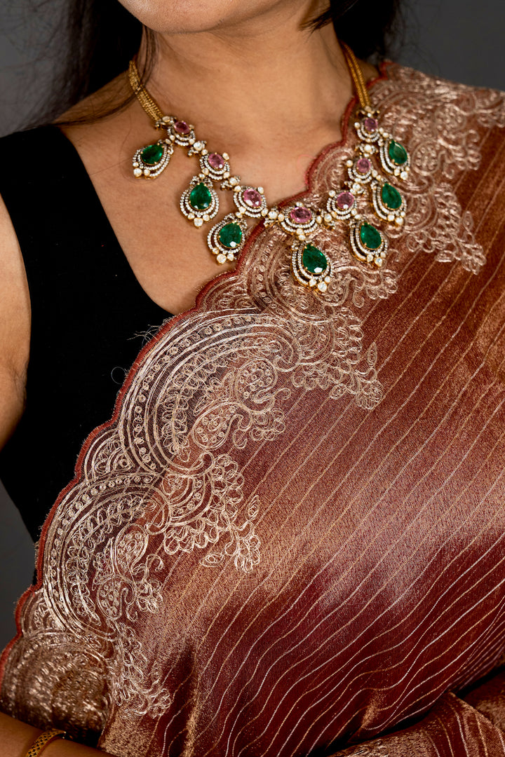 Handloom Pure Tissue Silk Saree with Pita Embroidered Borders and Paithani Pen Kalamkari Blouse