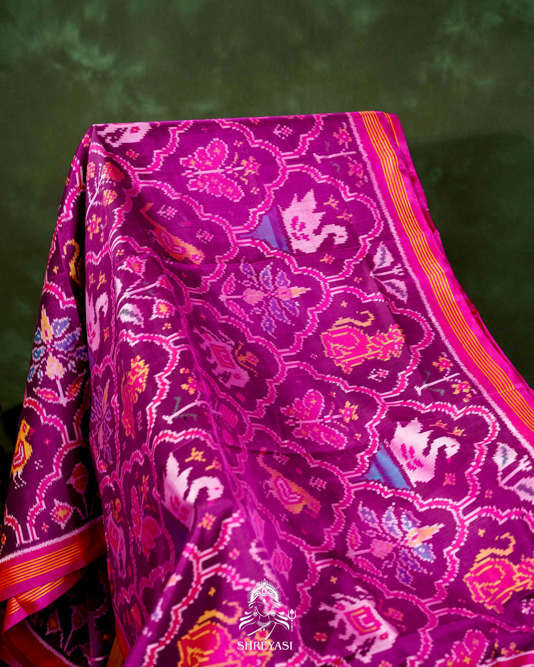 Handloom Rajkot Patola Silk Saree in Purple with Multicolor Ikat