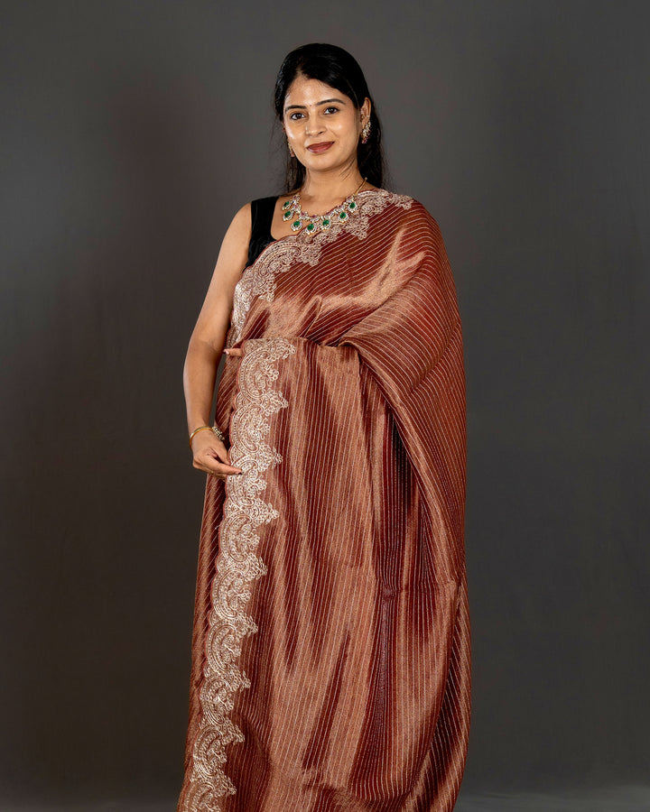 Handloom Pure Tissue Silk Saree with Pita Embroidered Borders and Paithani Pen Kalamkari Blouse