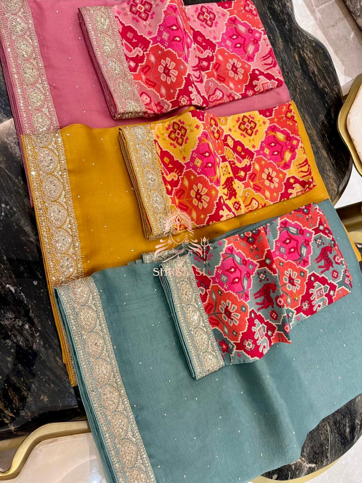 Pure Organza Silk Saree with Embellished Borders and Patola Print Silk Blouse