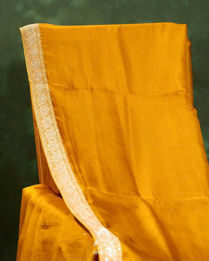 Pure Organza Silk Saree with Embellished Borders and Patola Print Silk Blouse